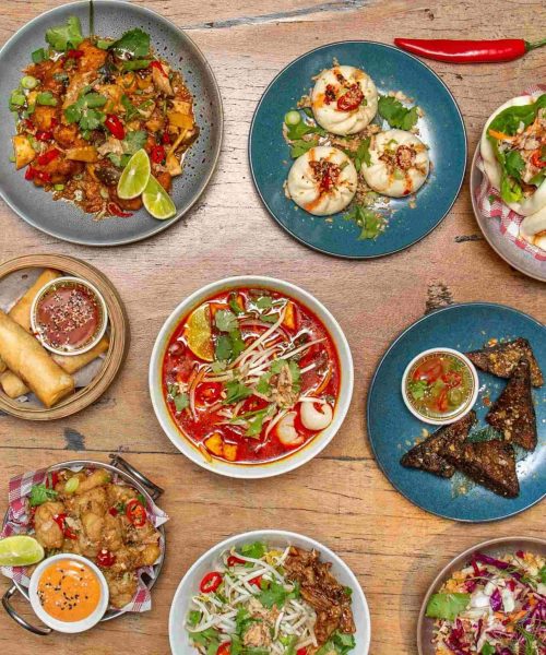 Yullis-Foodscape Wide range of plates and dishes set out on a table