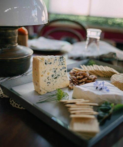taste-byron-bay-produce-shot cheese board laid out on a table